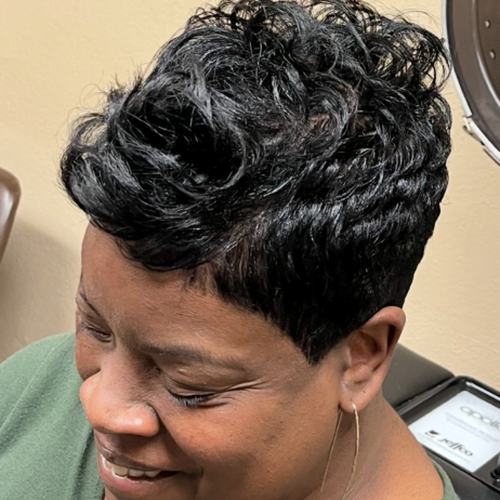 Glossy black pixie with soft curls