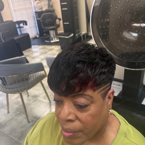 Short hairstyle with taper sides and red accent